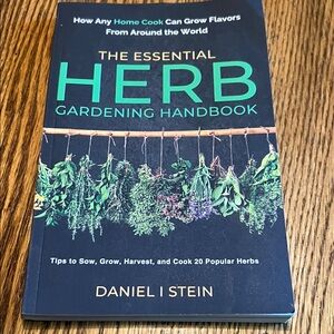 The Essential Herb Gardening Handbook by Daniel I. Stein - Dark Blue Cover